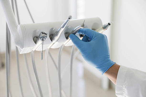 Professional Tooth Extraction technician working in New Iberia, LA